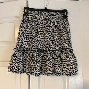 She in ruffle miniskirt size Small.